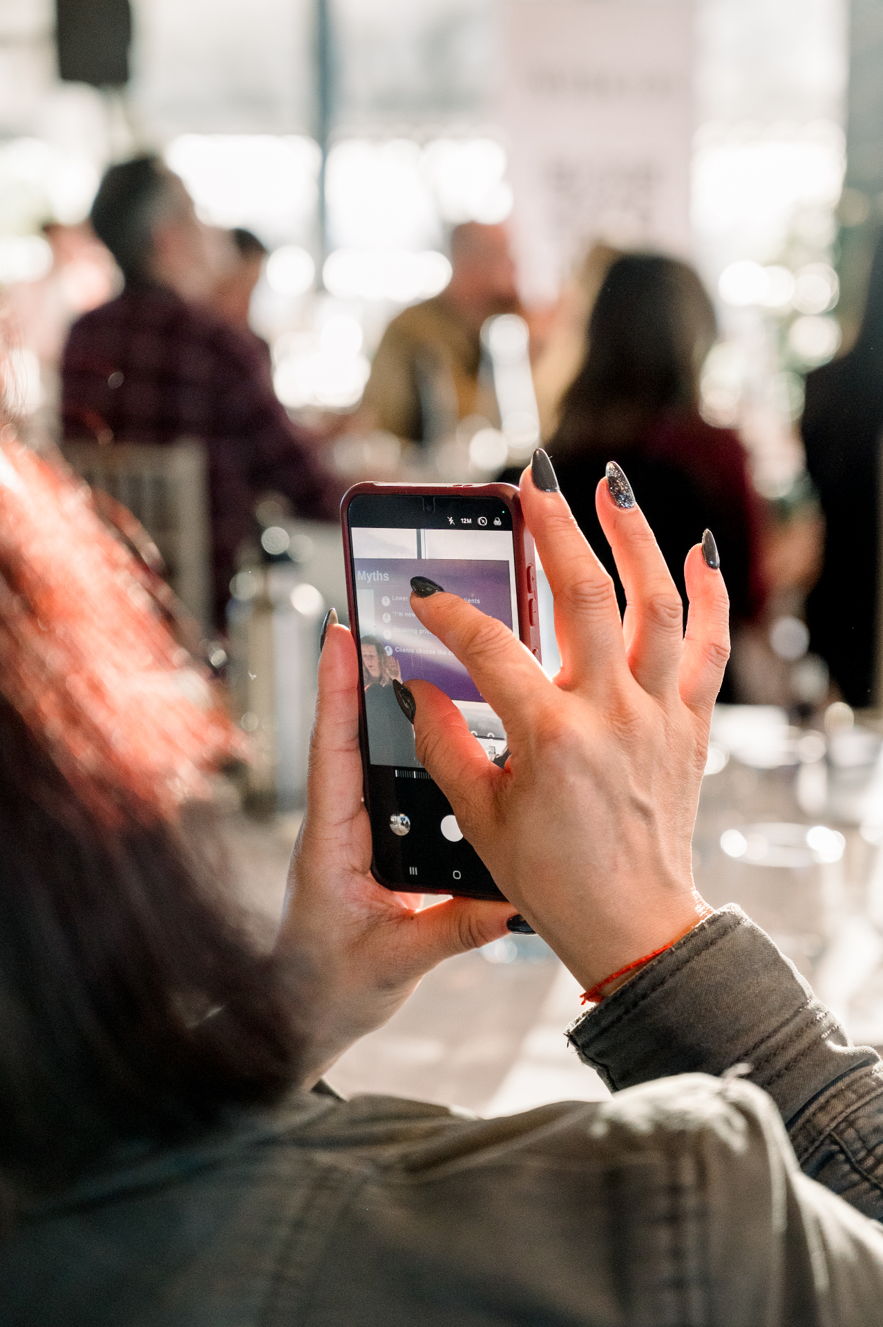 Attendee capturing the moment