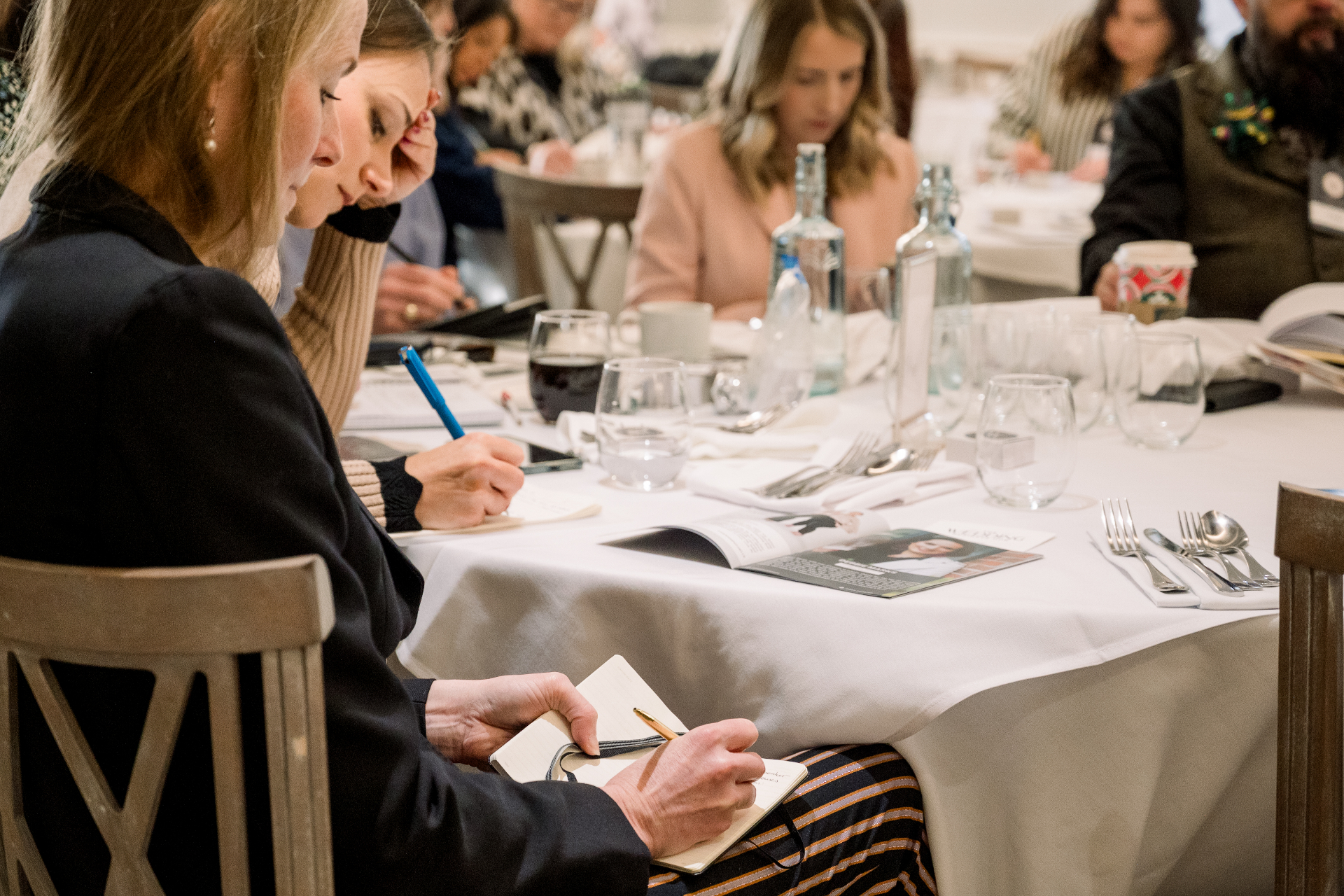 Attendees taking notes